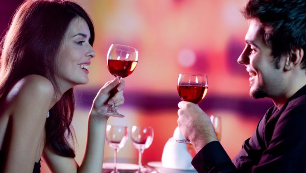 couple drinking wine during their date night