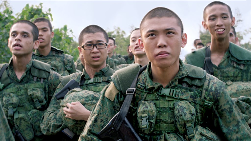 men in military uniform from a scene in Netflix movie Ah Boys to Men