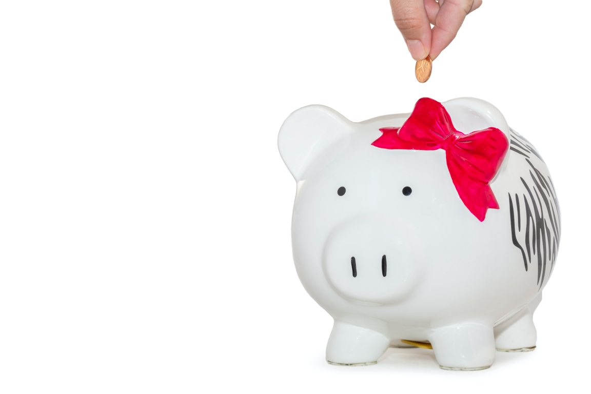 white piggy bank used as parenting tips to teach financial literacy for kids